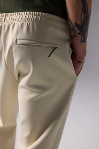 PANTALÓN TECH DUSTY CREAM