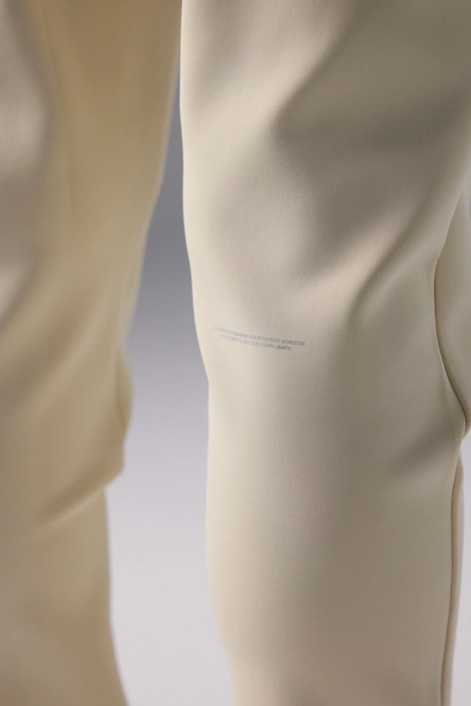PANTALÓN TECH DUSTY CREAM