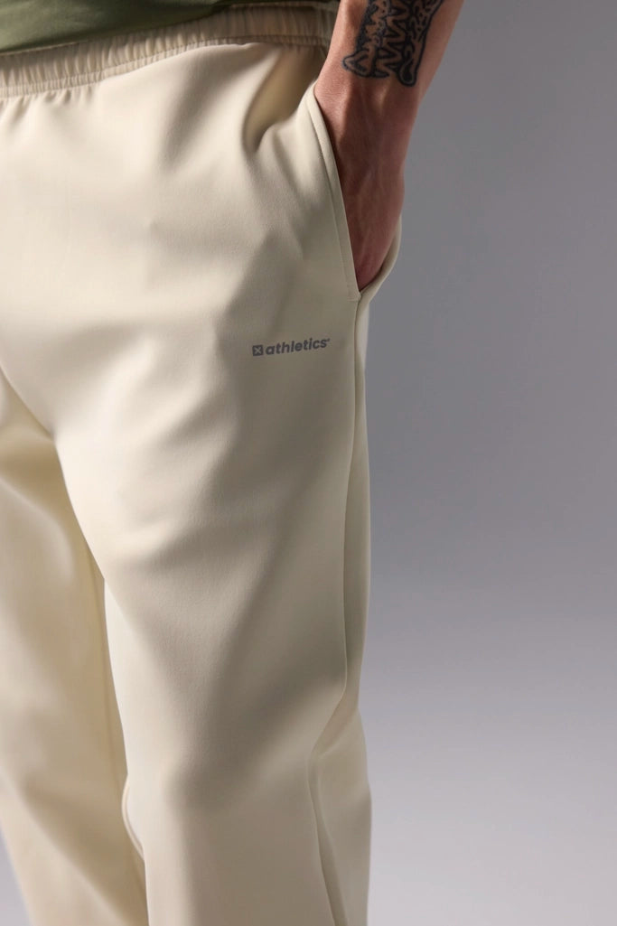 PANTALÓN TECH DUSTY CREAM