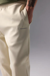 PANTALÓN TECH DUSTY CREAM
